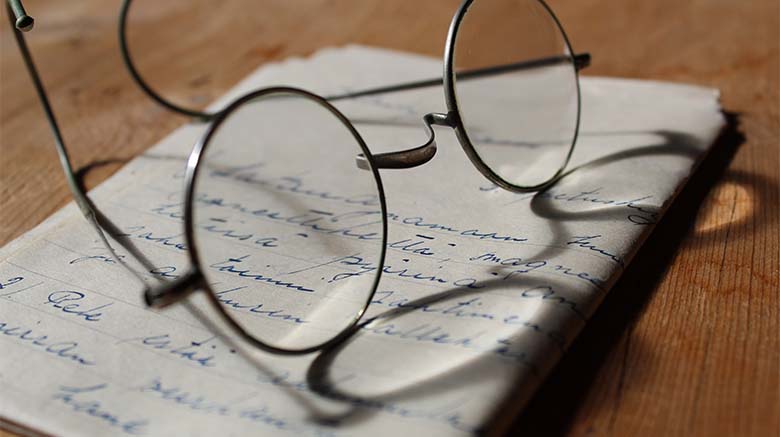 Glasses on Letter